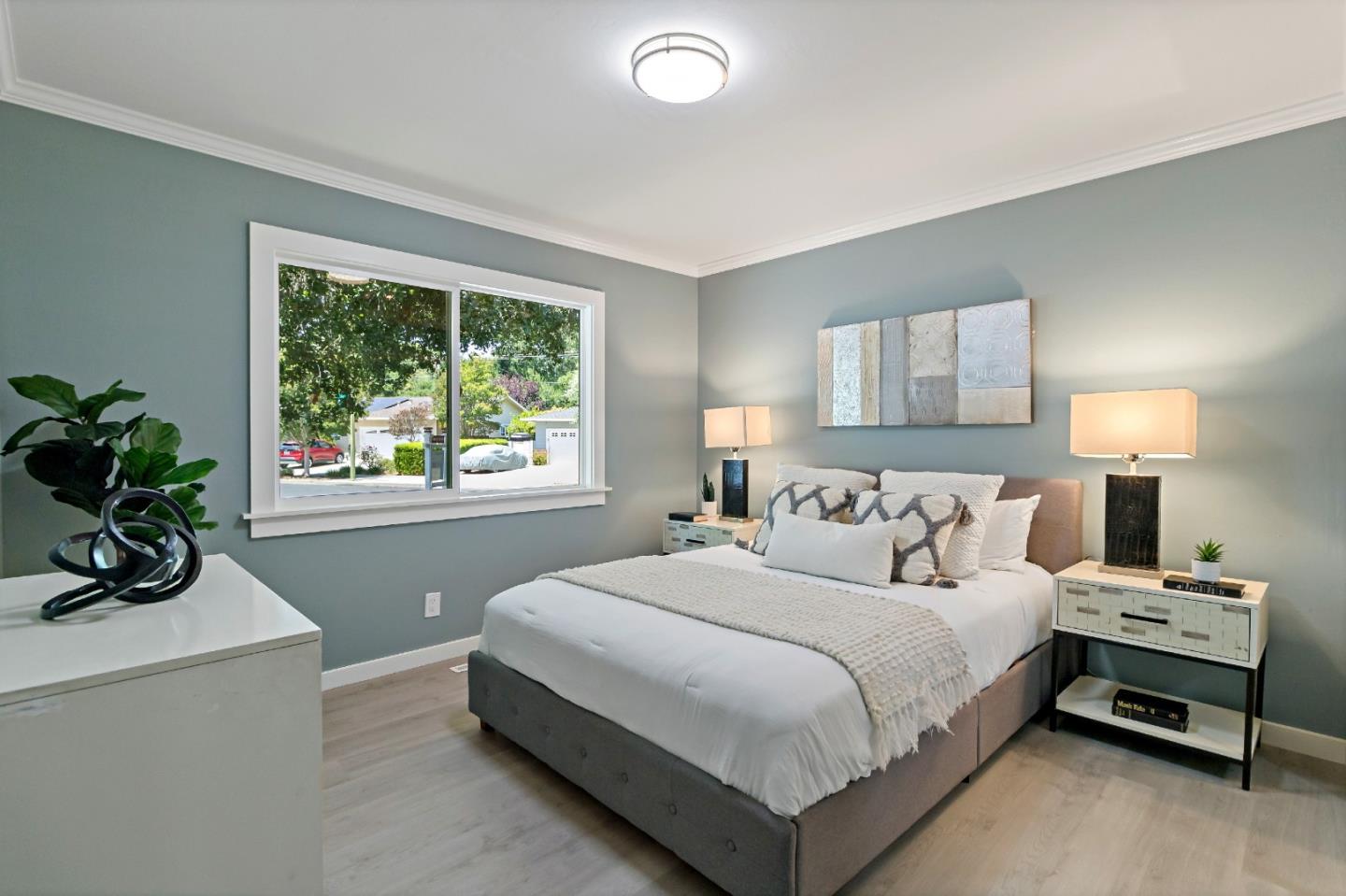 1502 Petersen Avenue San Jose, CA 95129 - Photo 24 of 56 a bedroom with a bed and a window