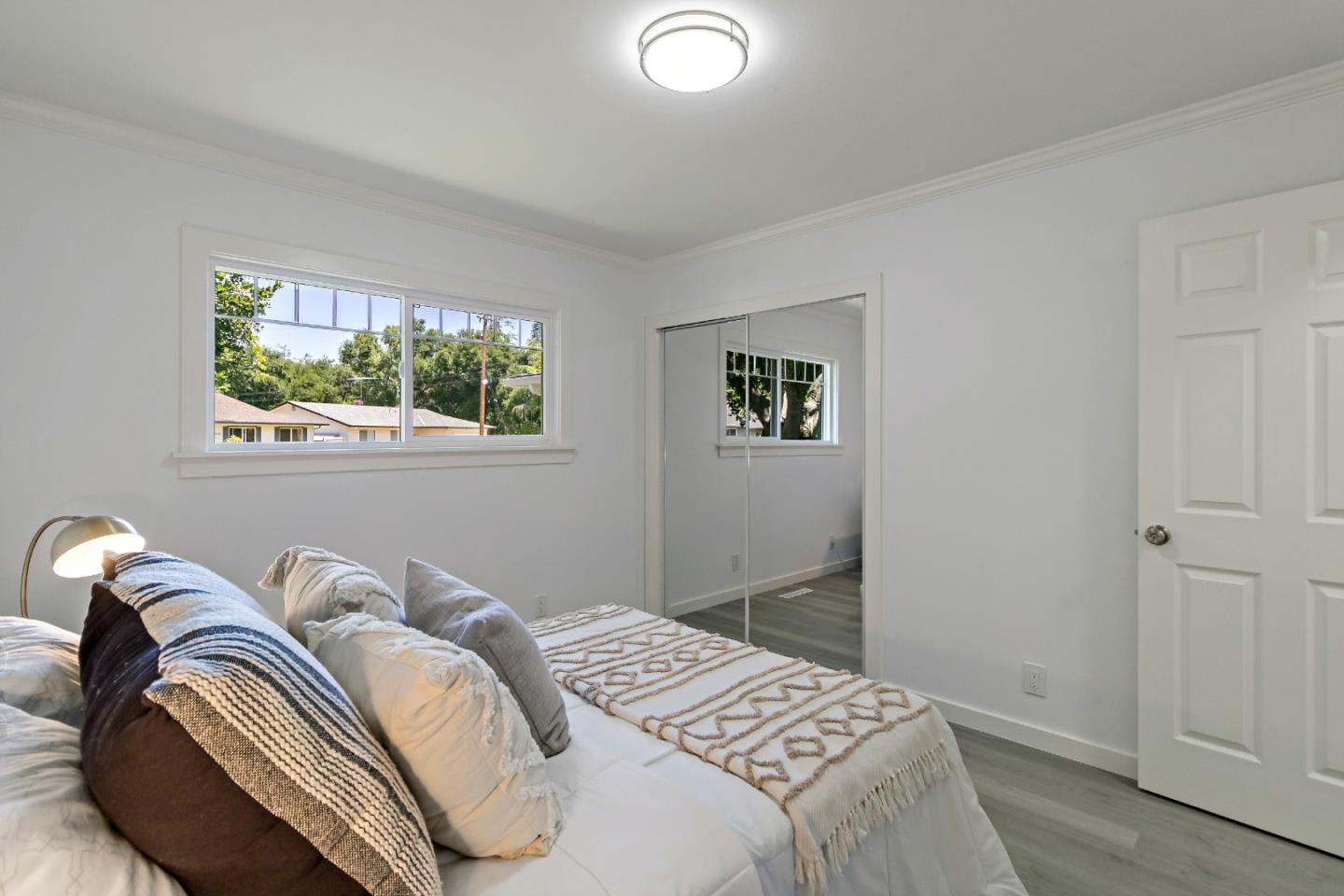 1502 Petersen Avenue San Jose, CA 95129 - Photo 28 of 56 a bedroom with bed and a window