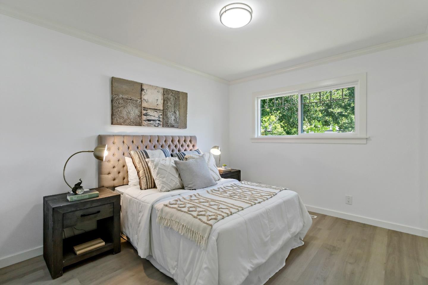 1502 Petersen Avenue San Jose, CA 95129 - Photo 29 of 56 a bedroom with a bed and balcony