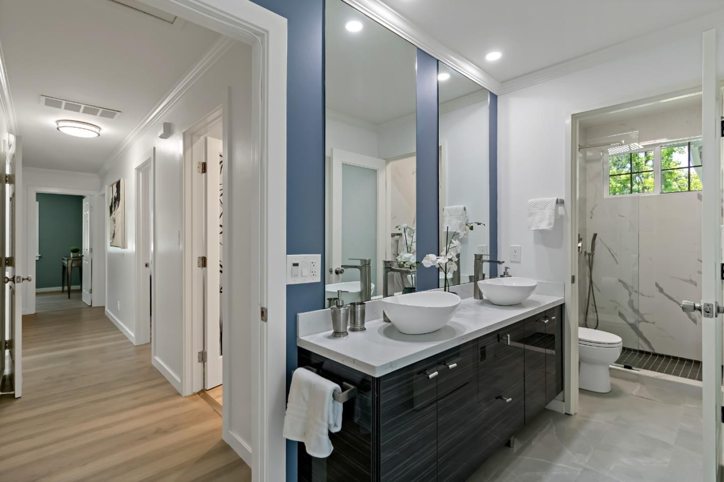 1502 Petersen Avenue San Jose, CA 95129 - Photo 31 of 56 a bathroom with a sink and a mirror