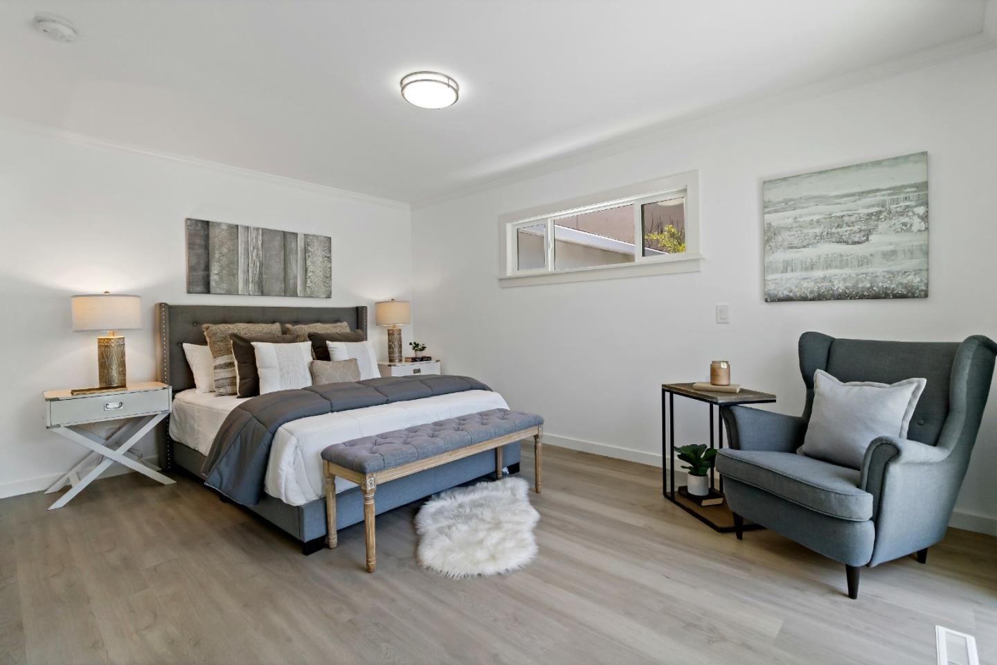 1502 Petersen Avenue San Jose, CA 95129 - Photo 32 of 56 a bedroom with a bed and a couch