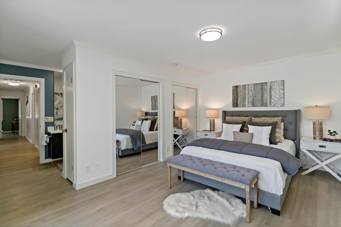 1502 Petersen Avenue San Jose, CA 95129 - Photo 33 of 56 a bedroom with a bed and a view of living room