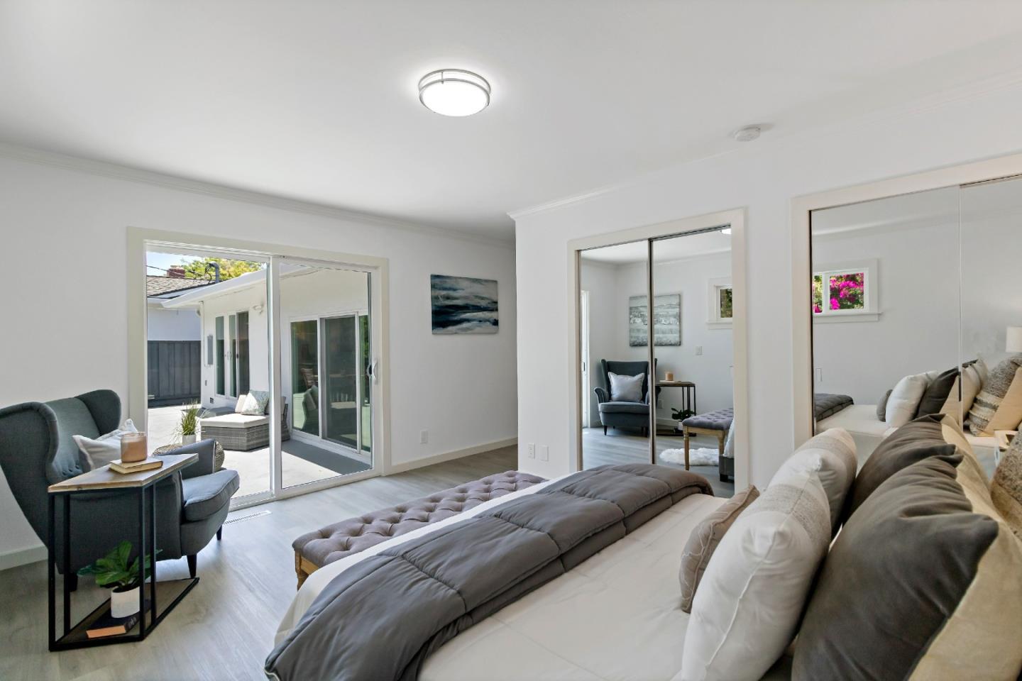 1502 Petersen Avenue San Jose, CA 95129 - Photo 34 of 56 a bedroom with a bed and wooden floor