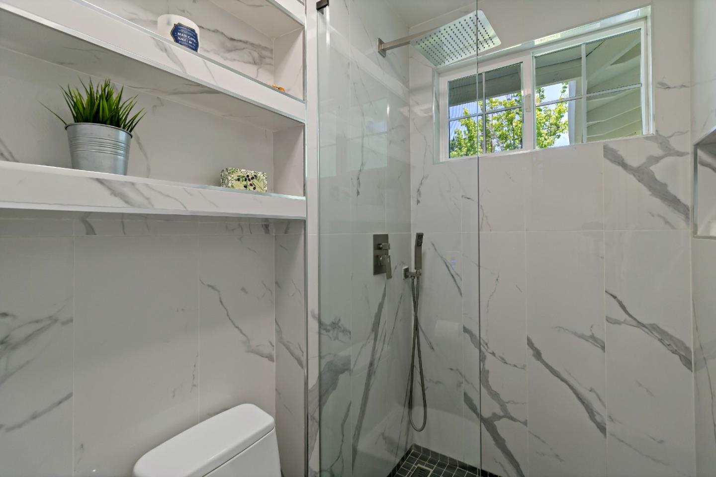 1502 Petersen Avenue San Jose, CA 95129 - Photo 35 of 56 a bathroom with a toilet and a shower