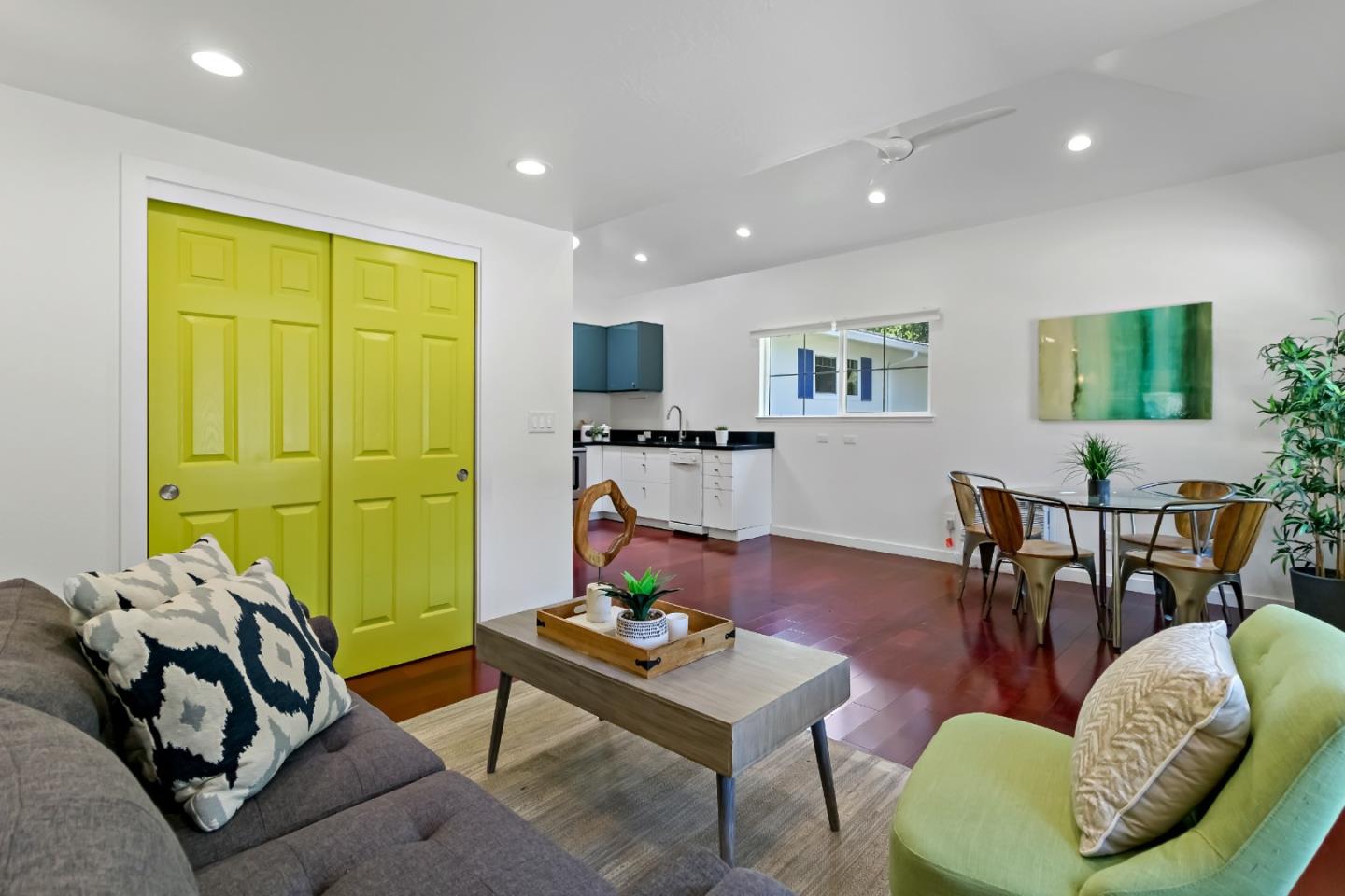 1502 Petersen Avenue San Jose, CA 95129 - Photo 38 of 56 a living room with furniture and a flat screen tv