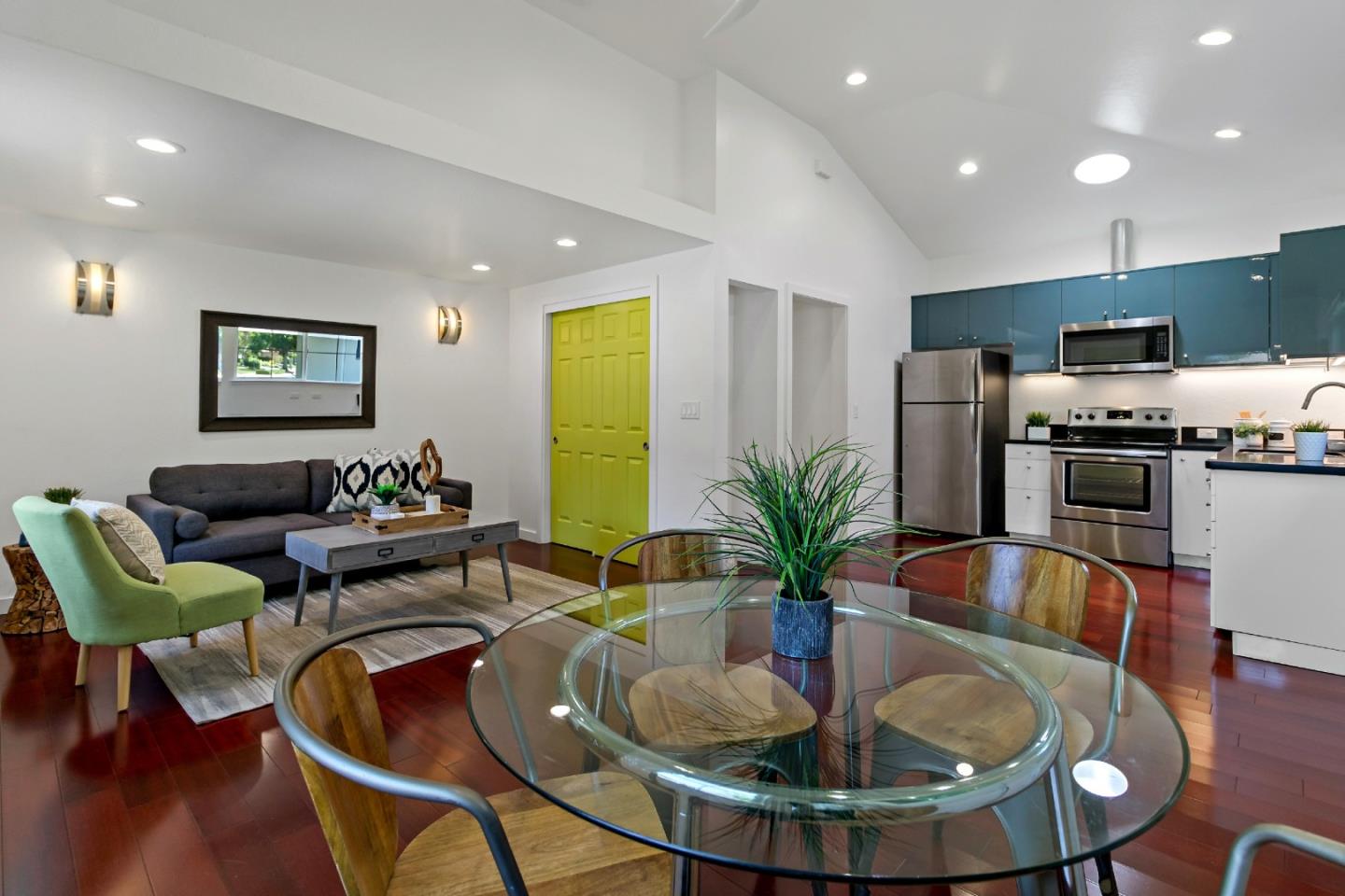 1502 Petersen Avenue San Jose, CA 95129 - Photo 39 of 56 a living room with stainless steel appliances furniture dining table and wooden floor