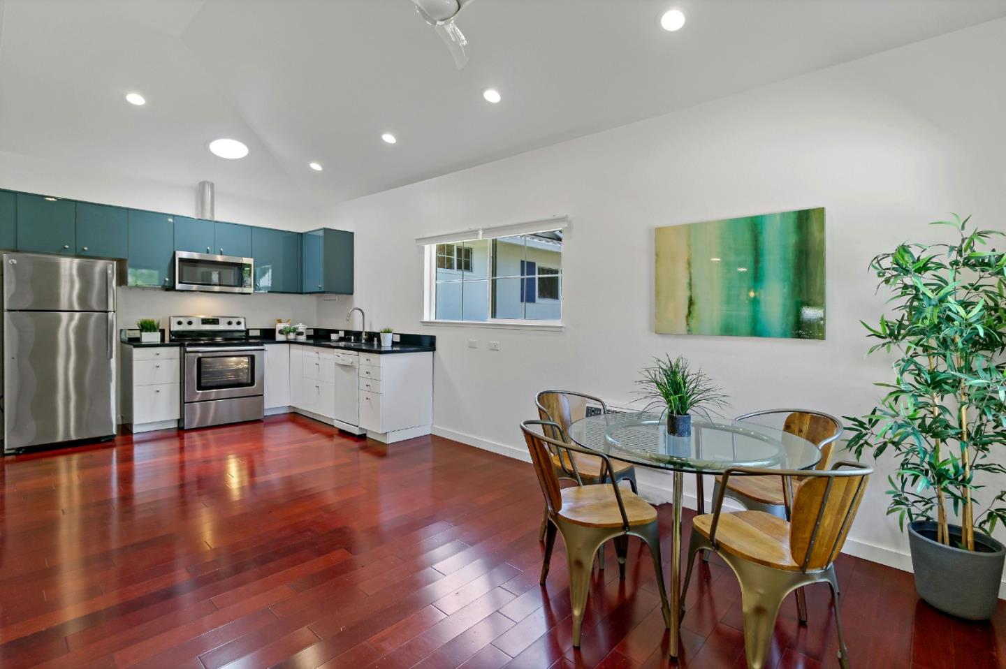 1502 Petersen Avenue San Jose, CA 95129 - Photo 40 of 56 a view of a dining room with furniture and a kitchen