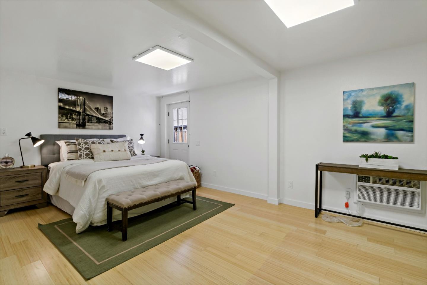 1502 Petersen Avenue San Jose, CA 95129 - Photo 43 of 56 a bedroom with a bed and a flat screen tv