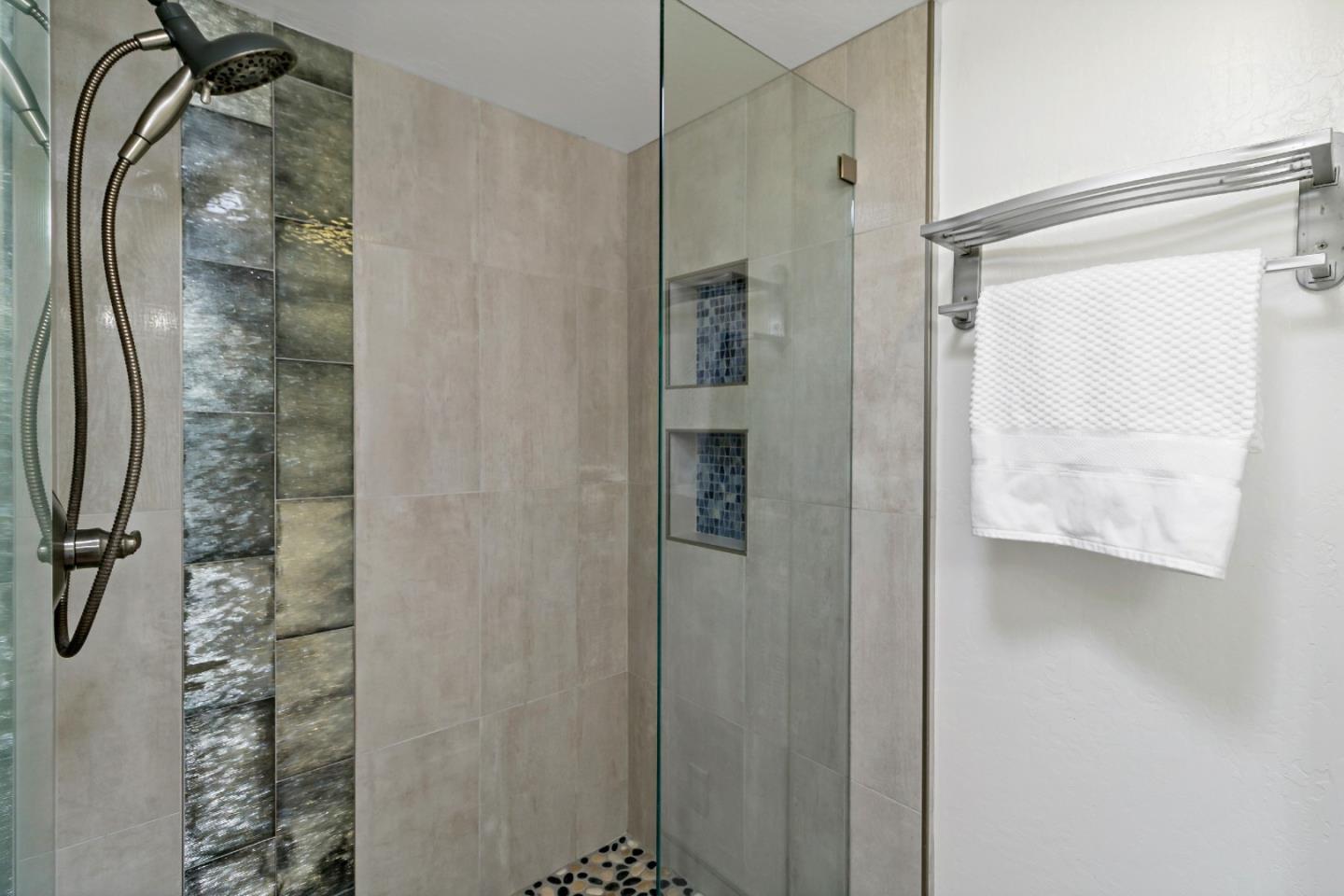 1502 Petersen Avenue San Jose, CA 95129 - Photo 45 of 56 a bathroom with a shower and a mirror