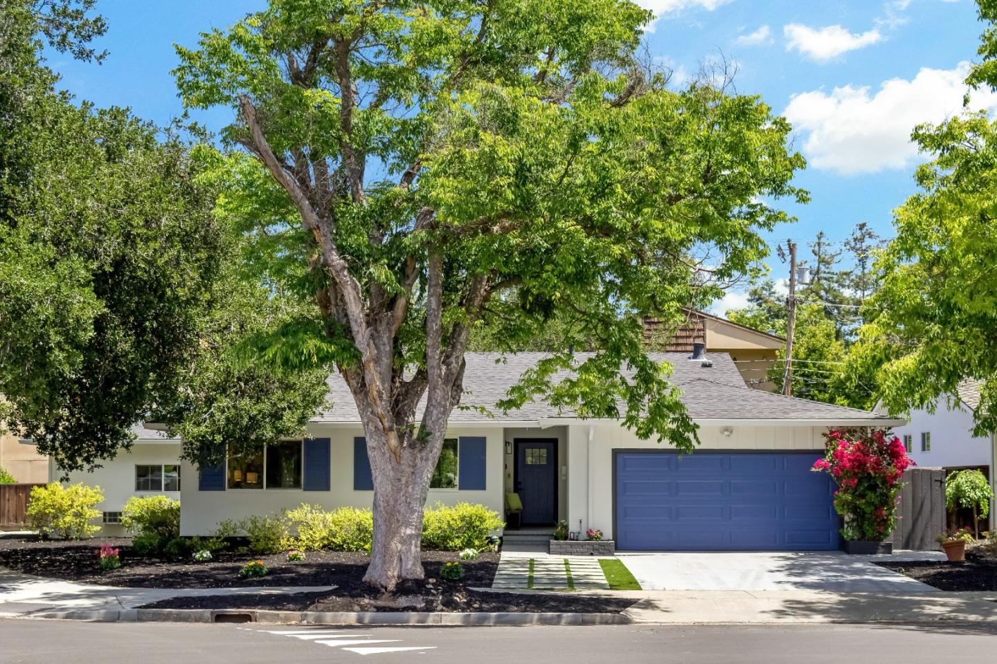 1502 Petersen Avenue San Jose, CA 95129 - Photo 5 of 56 a front view of a house with yard