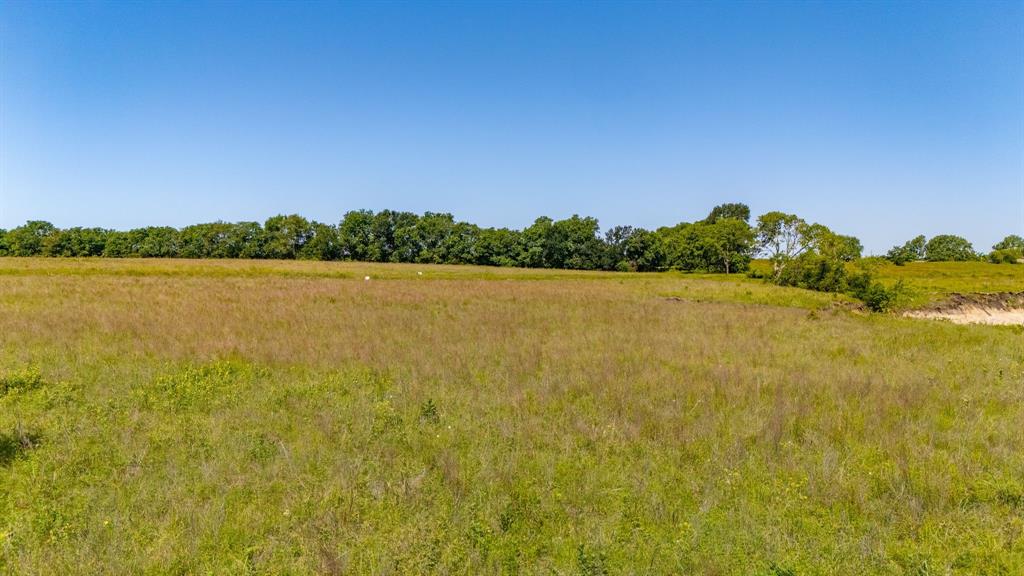 1625 Fm 904 Street South, Unit ES Commerce, TX 75428 - Photo 11 of 22 a view of lake with mountain