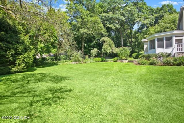 29 Weston Hill Road Riverside, CT 06878 - Photo 11 of 39 a view of a house with a backyard