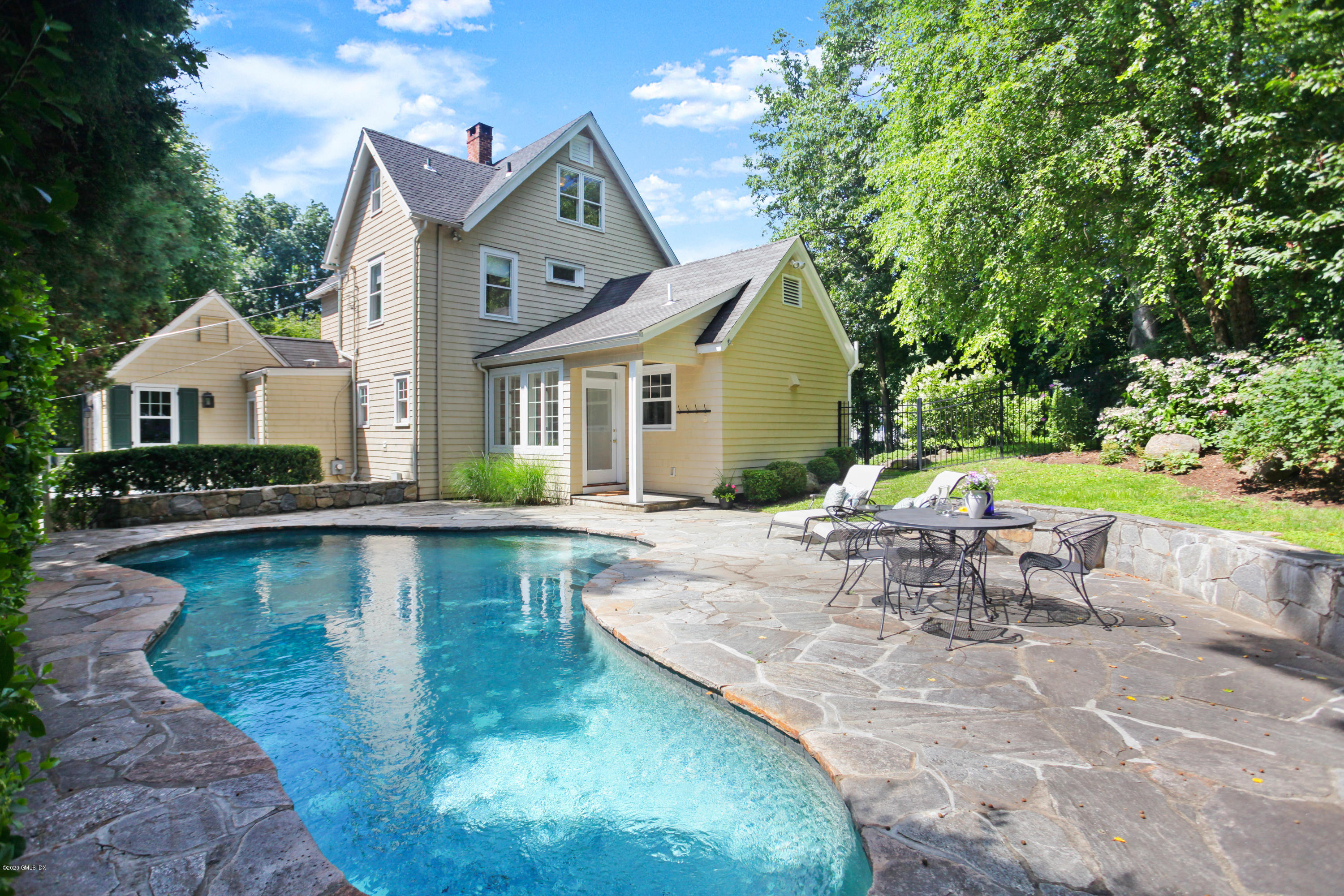 29 Weston Hill Road Riverside, CT 06878 - Photo 3 of 39 an aerial view of a house with swimming pool garden and patio