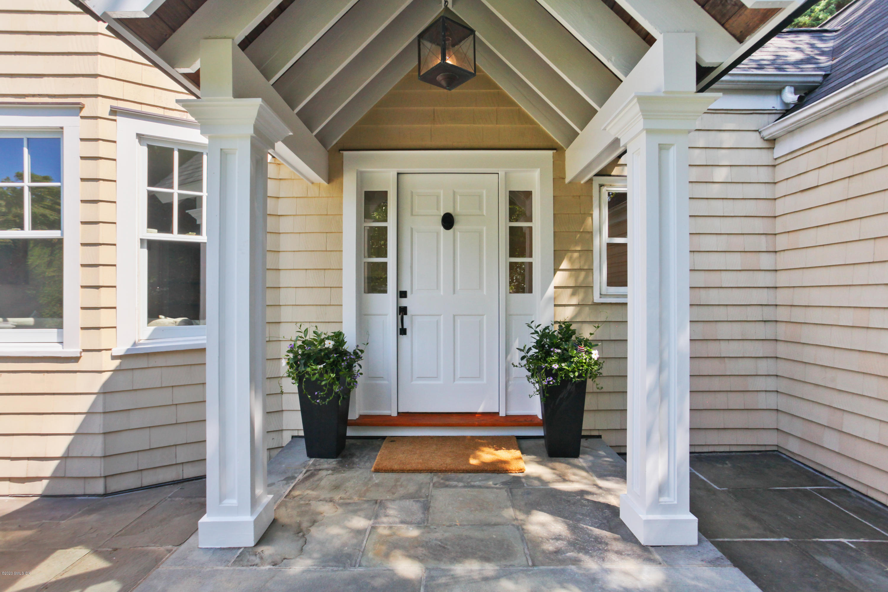 29 Weston Hill Road Riverside, CT 06878 - Photo 5 of 39 a view of a entryway door front of house