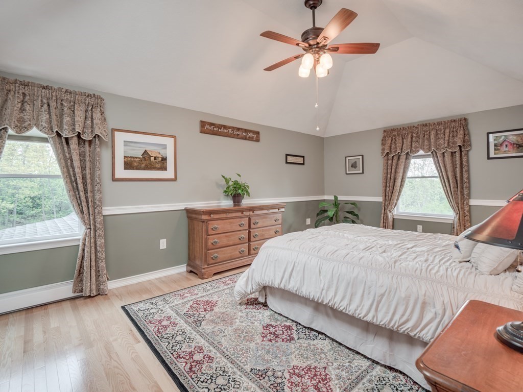 21 Scenic View Drive Pelham, NH 03076 - Photo 31 of 42 a bedroom with a bed and a window