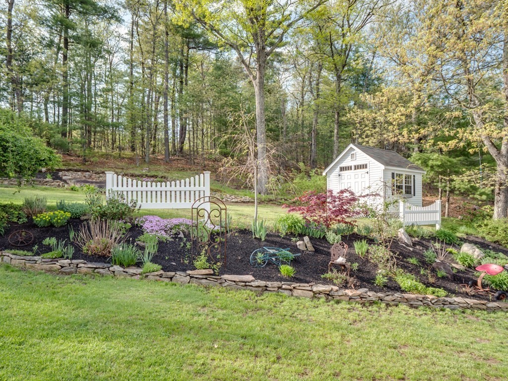 21 Scenic View Drive Pelham, NH 03076 - Photo 5 of 42 a front view of a house with garden