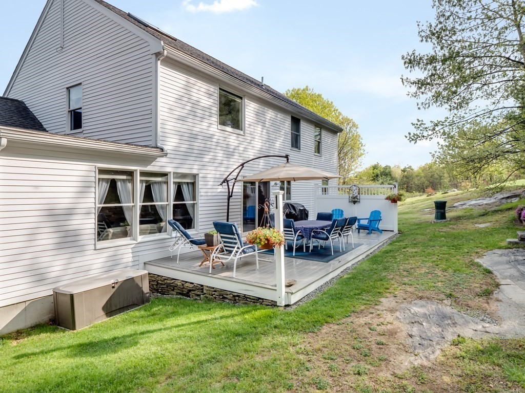 21 Scenic View Drive Pelham, NH 03076 - Photo 6 of 42 a view of a house with a yard patio and sitting area