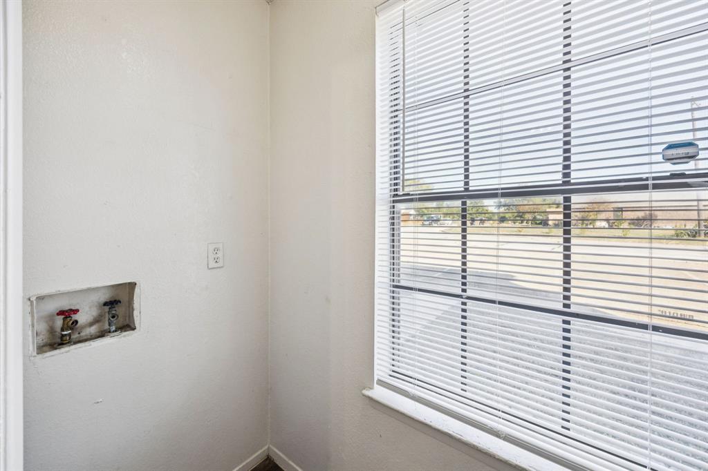 8109 Silver Creek Road, Unit B White Settlement, TX 76108 - Photo 23 of 28 a view of a window and a window