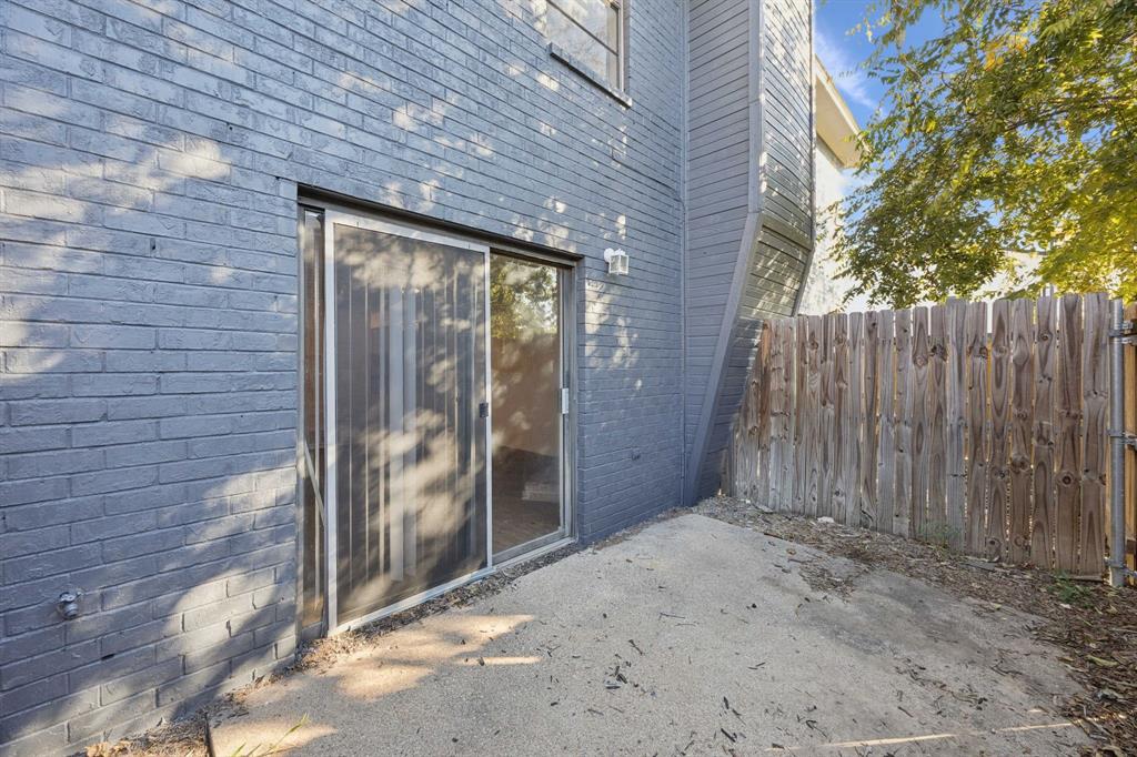 8109 Silver Creek Road, Unit B White Settlement, TX 76108 - Photo 25 of 28 a view of backyard with wooden fence