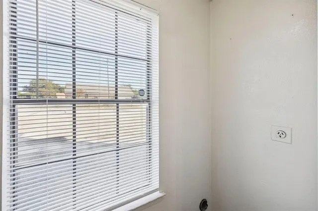 a view of a bathroom with a window