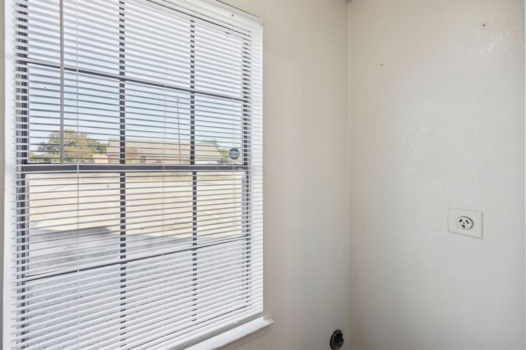 8109 Silver Creek Road, Unit B White Settlement, TX 76108 - Photo 6 of 28 a view of a bathroom with a window