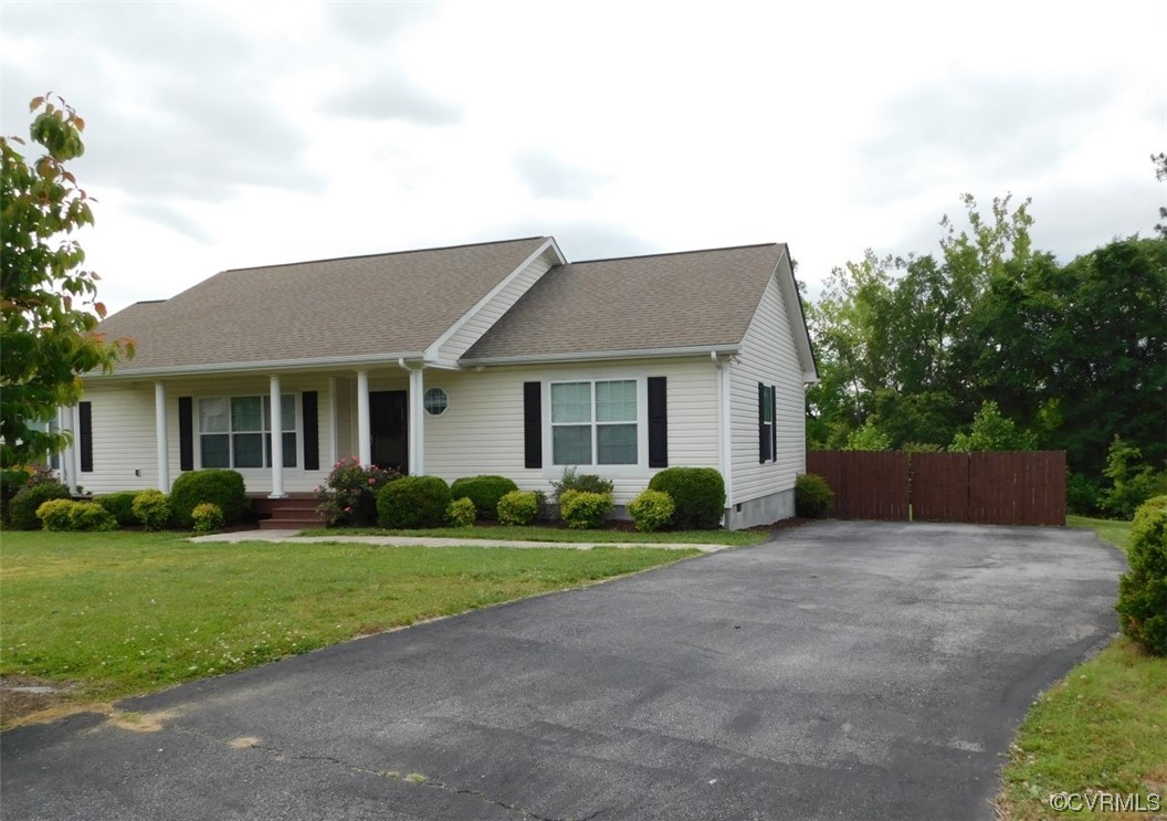 109 Jay's Road Farmville, VA 23901 - Photo 26 of 31 a front view of a house with a yard and garage