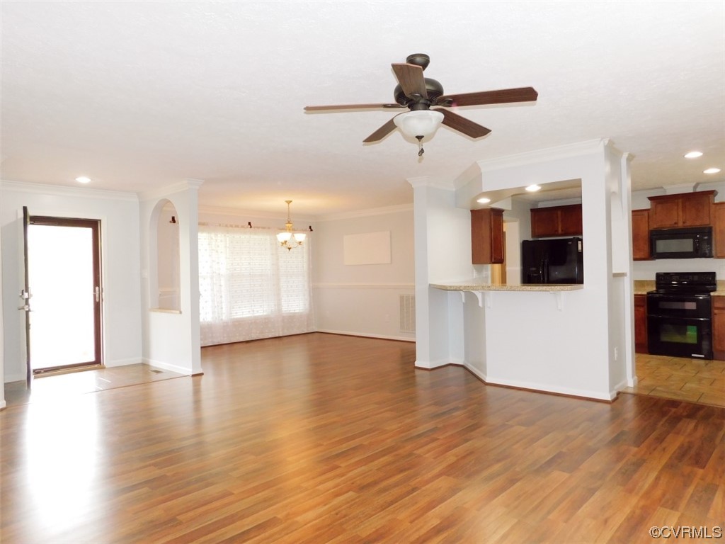 109 Jay's Road Farmville, VA 23901 - Photo 8 of 31 a view of a room with wooden floor and ceiling fan