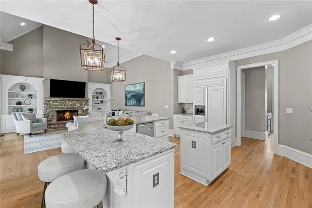 a living room with furniture fireplace and a flat screen tv