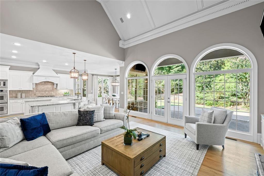 2281 Bransley Place Duluth, GA 30097 - Photo 22 of 70 a living room with furniture and a large window