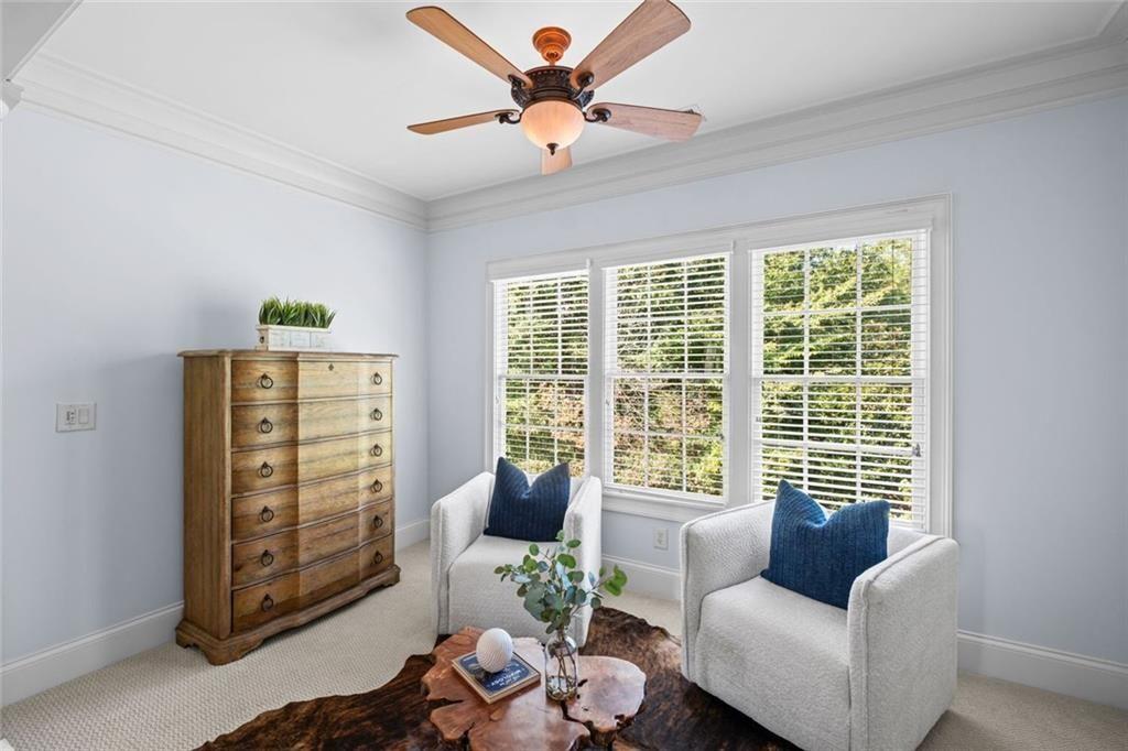 2281 Bransley Place Duluth, GA 30097 - Photo 33 of 70 a living room with furniture and a large window