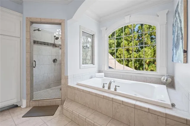 a room with pool table and windows