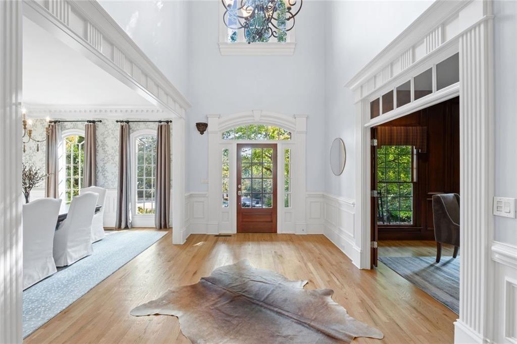 2281 Bransley Place Duluth, GA 30097 - Photo 4 of 70 a view of an entryway with wooden floor and garden