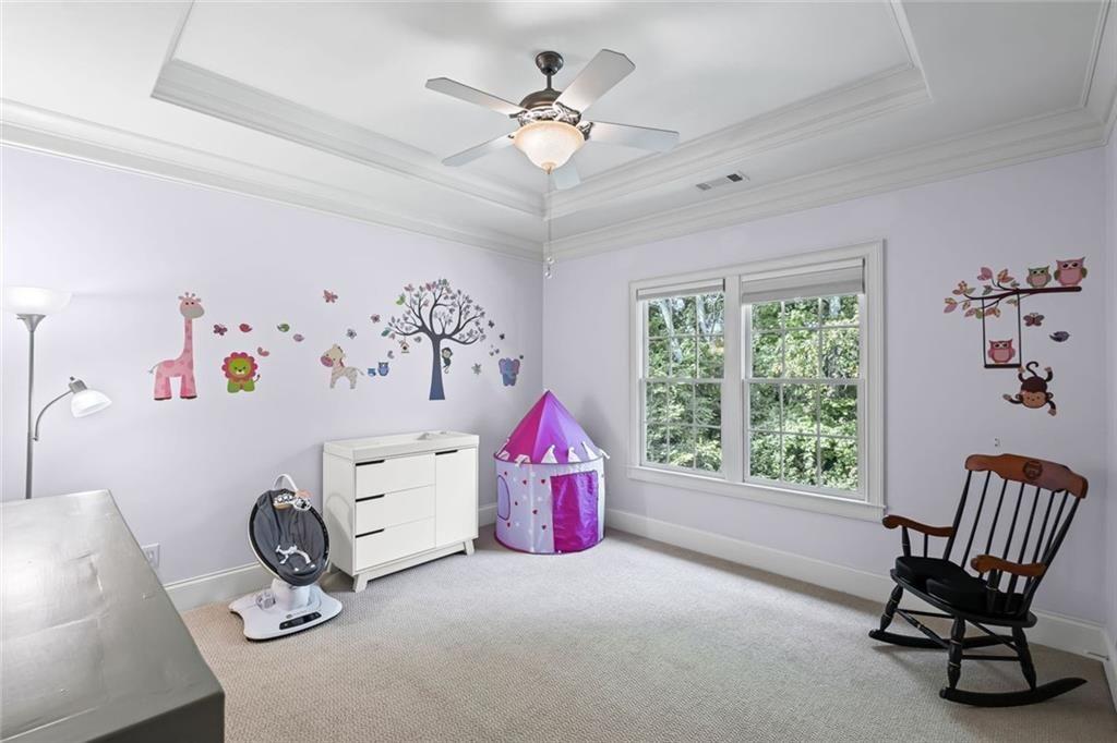 2281 Bransley Place Duluth, GA 30097 - Photo 44 of 70 a room with furniture and a window