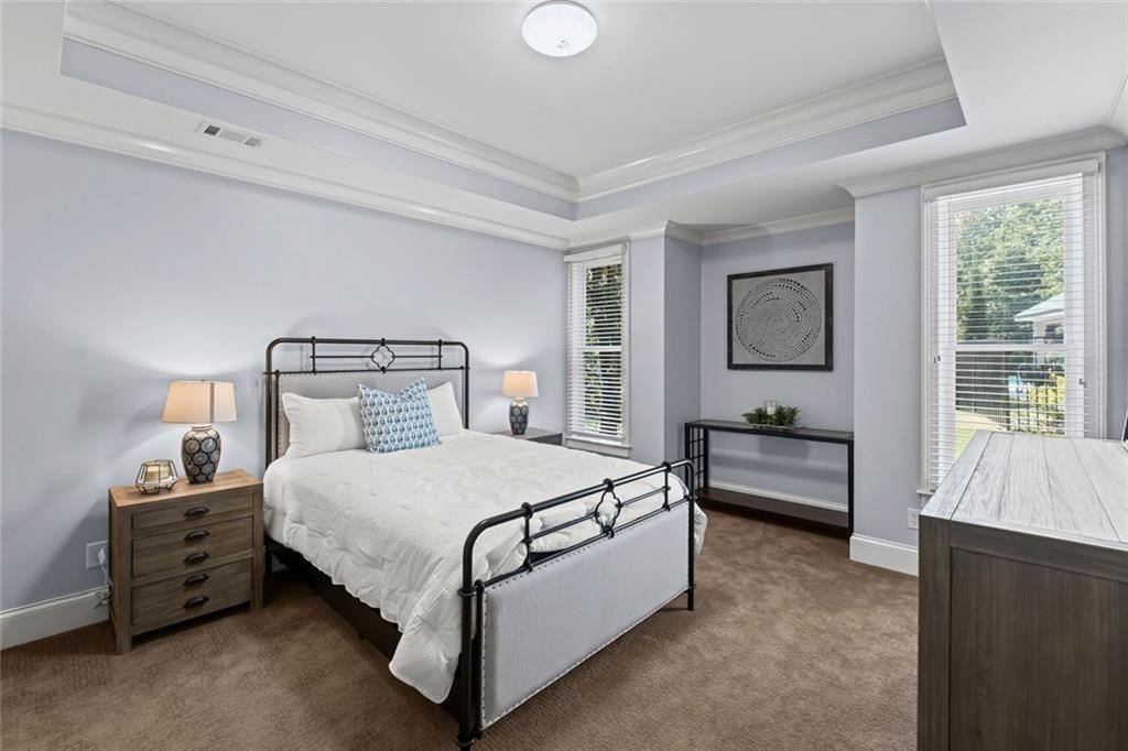 2281 Bransley Place Duluth, GA 30097 - Photo 46 of 70 a bedroom with a bed and a couch