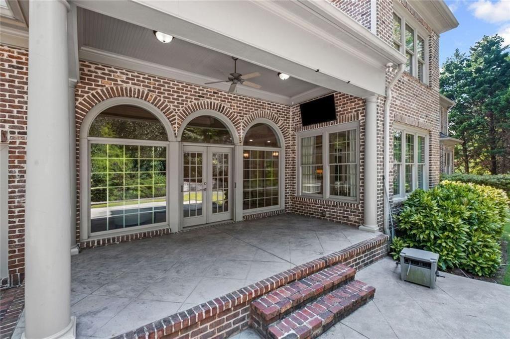 2281 Bransley Place Duluth, GA 30097 - Photo 55 of 70 a front view of a house with a garden