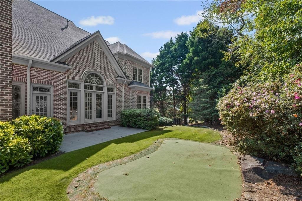 2281 Bransley Place Duluth, GA 30097 - Photo 56 of 70 a front view of a house with a yard