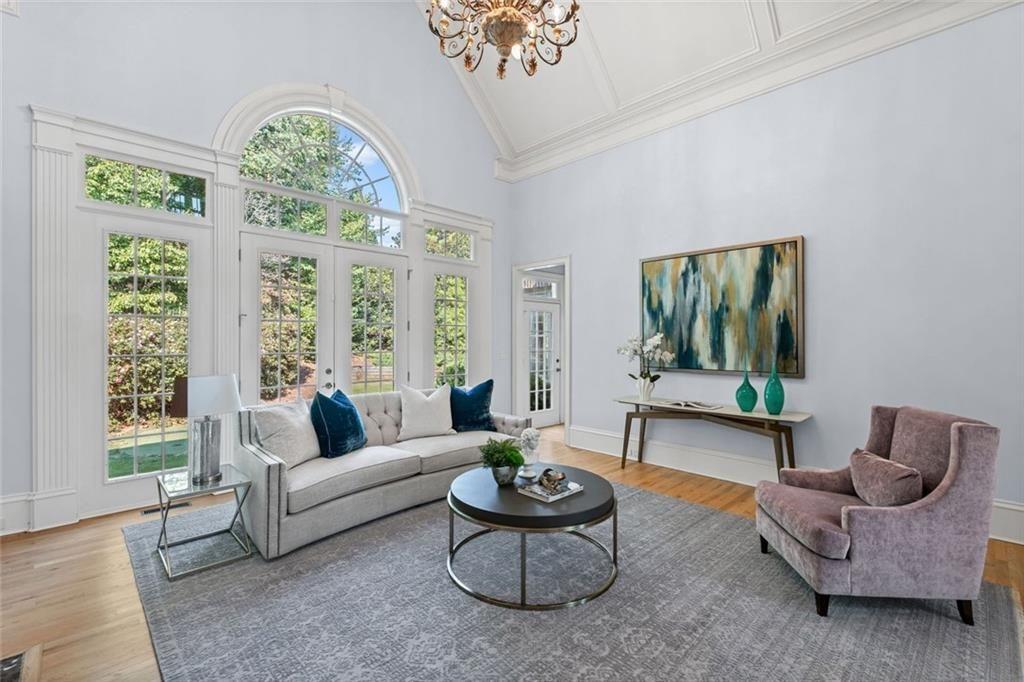 2281 Bransley Place Duluth, GA 30097 - Photo 10 of 70 a living room with furniture and a large window