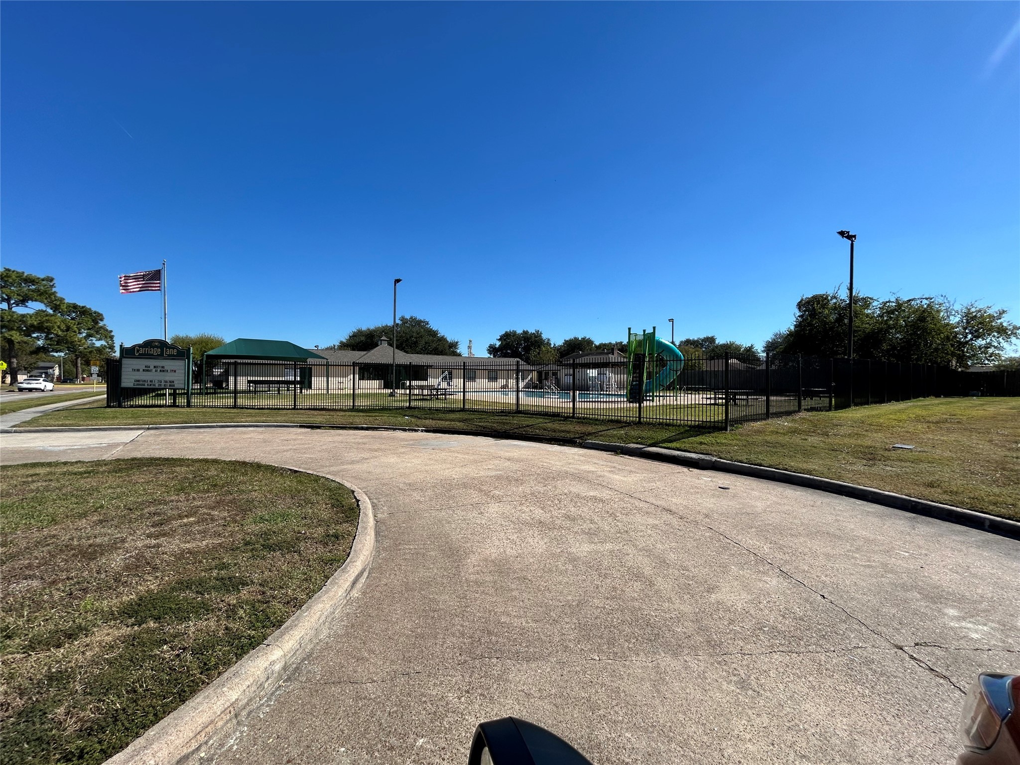 8523 Riverside Walk Lane Houston, TX 77064 - Photo 21 of 24 a view of a swimming pool with a yard