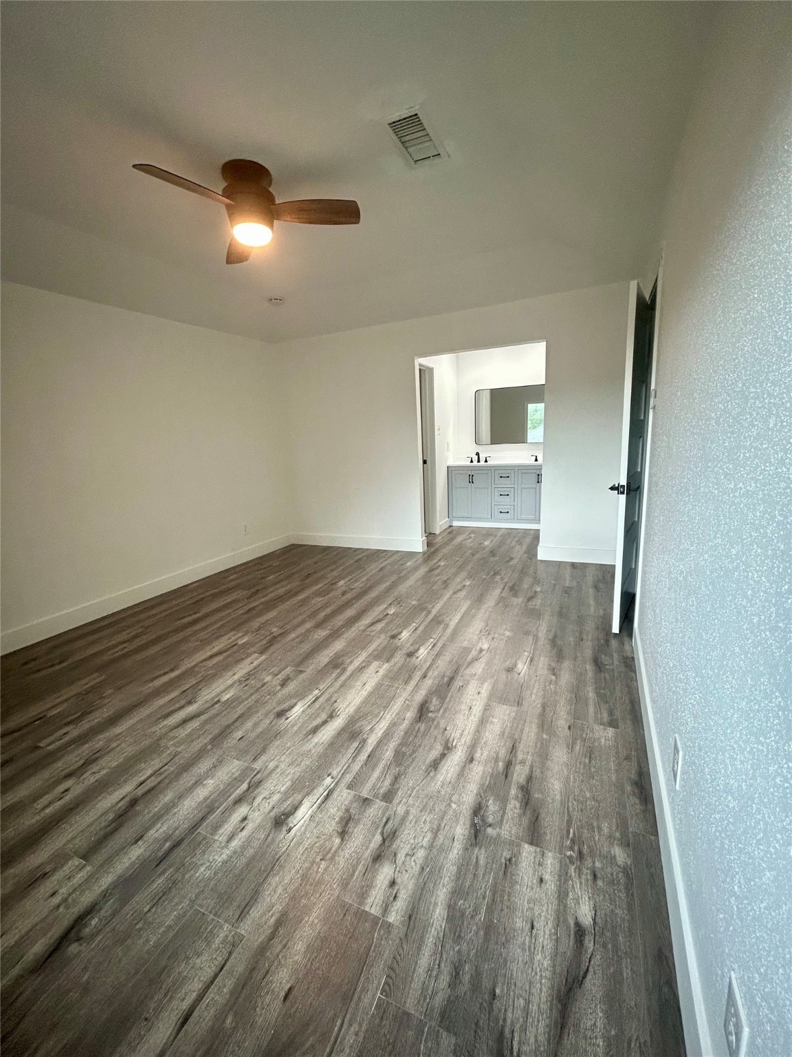 8523 Riverside Walk Lane Houston, TX 77064 - Photo 10 of 24 a view of empty room with wooden floor