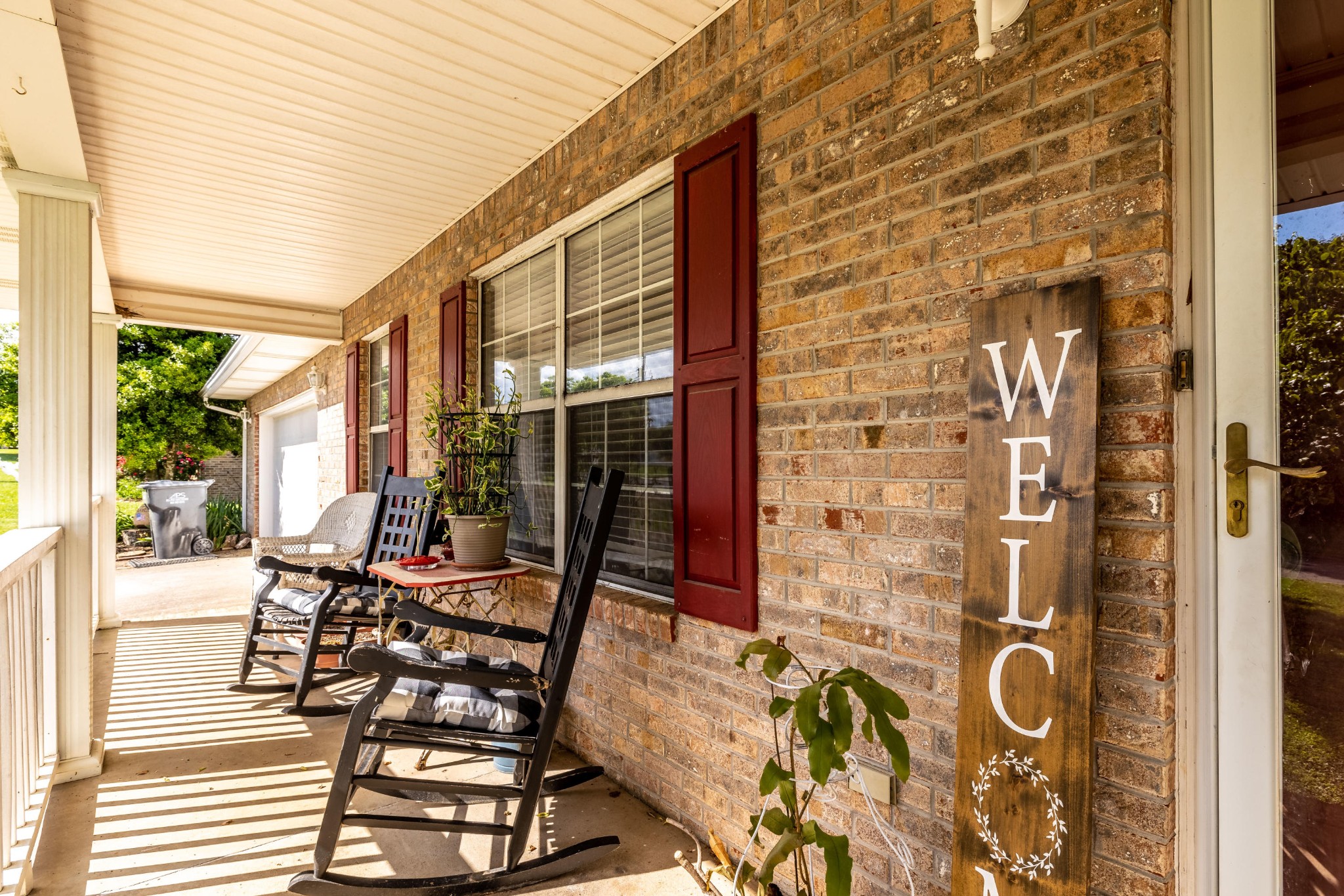442 Wilaway Road Maryville, TN 37801 - Photo 5 of 37 a view of a porch with chairs and floor to ceiling window