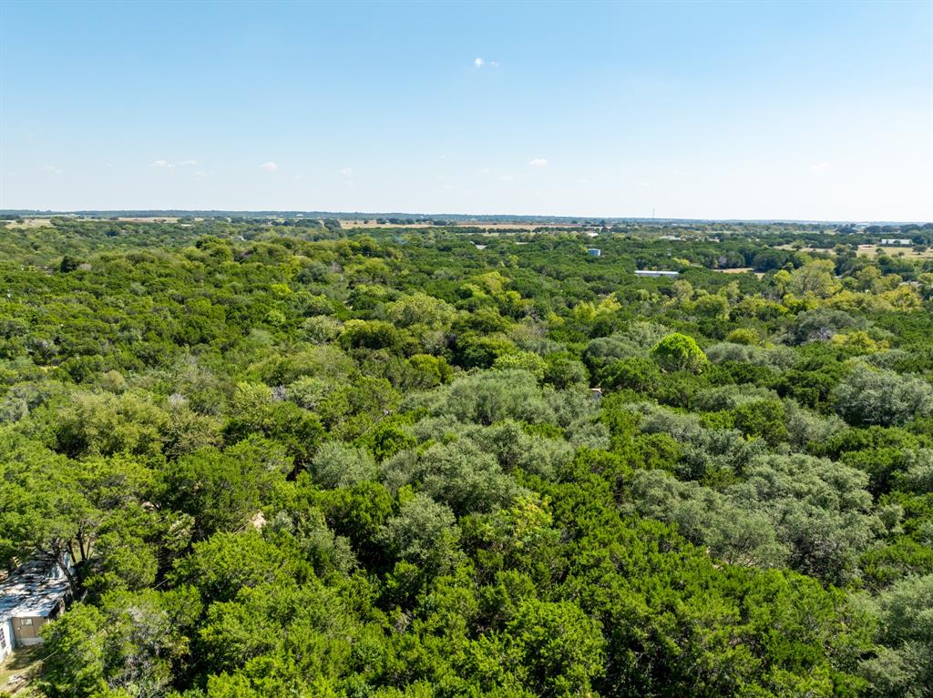 Tbd Palamino Loop Whitney, TX 76692 - Photo 14 of 18 an aerial view of a house with a yard