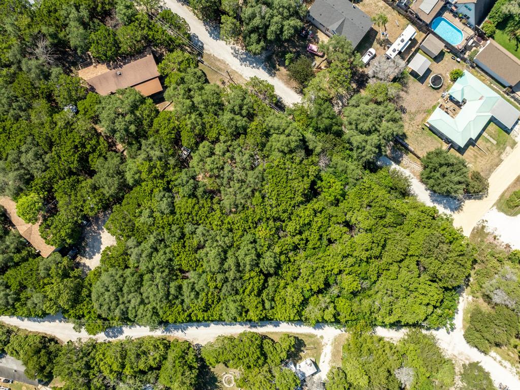 Tbd Palamino Loop Whitney, TX 76692 - Photo 5 of 18 an aerial view of a house with a yard