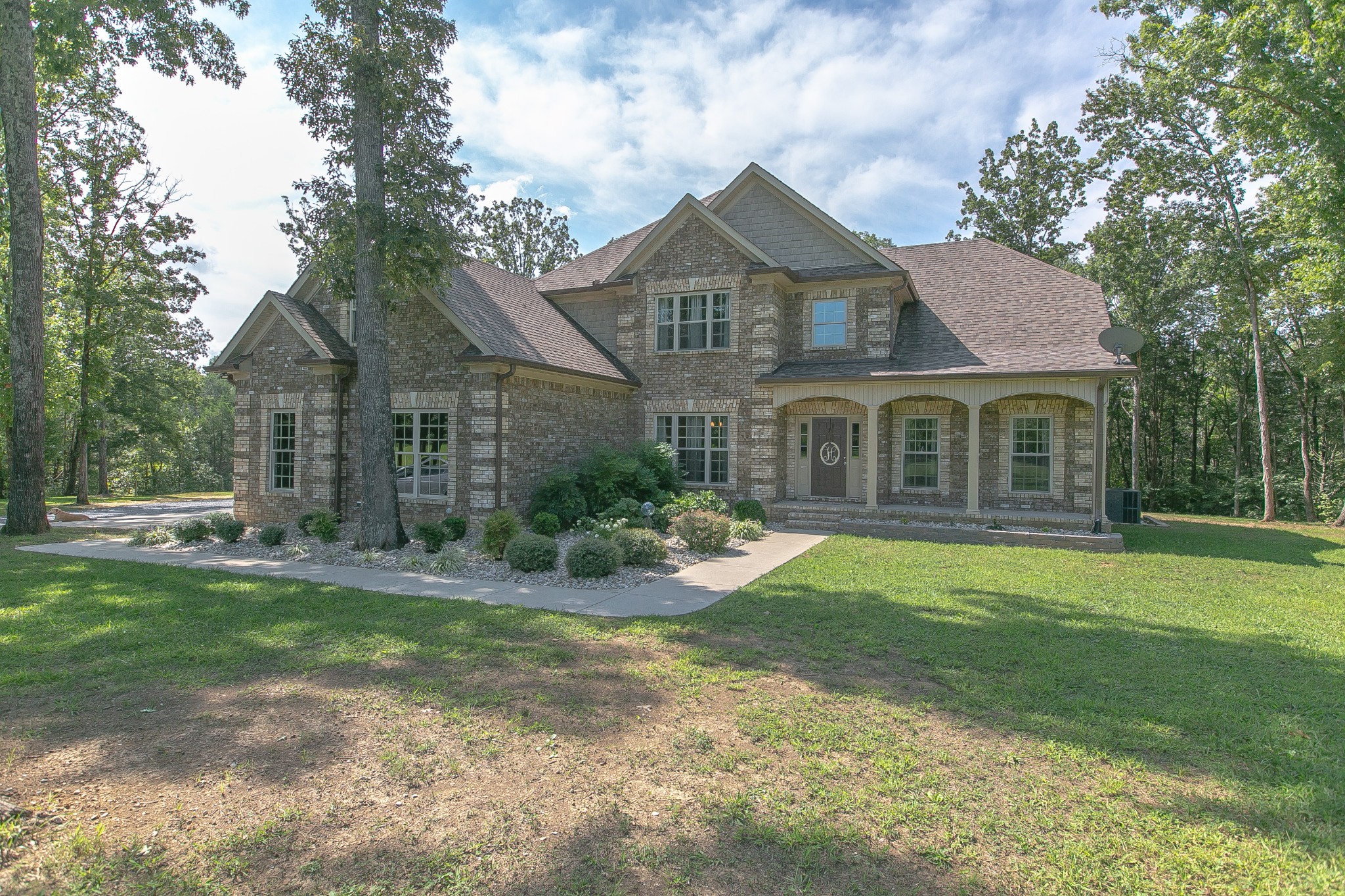 8798 Link Road Christiana, TN 37037 - Photo 2 of 32 a front view of a house with a yard