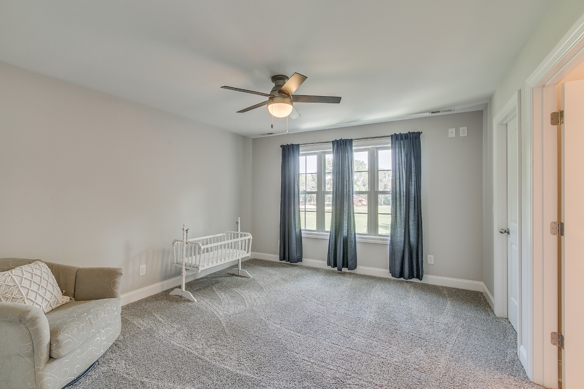 8798 Link Road Christiana, TN 37037 - Photo 25 of 32 a living room with furniture and a ceiling fan