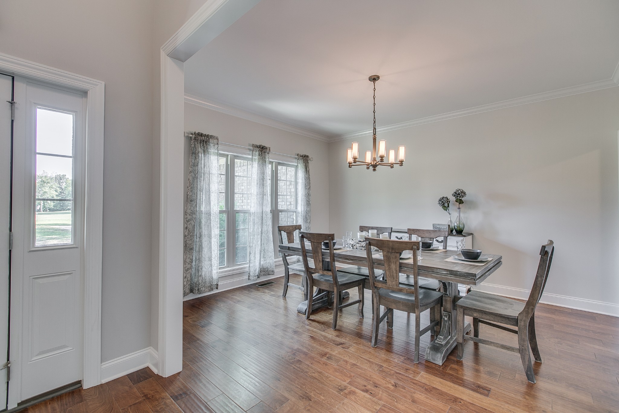 8798 Link Road Christiana, TN 37037 - Photo 9 of 32 a view of a dining room with furniture window and wooden floor