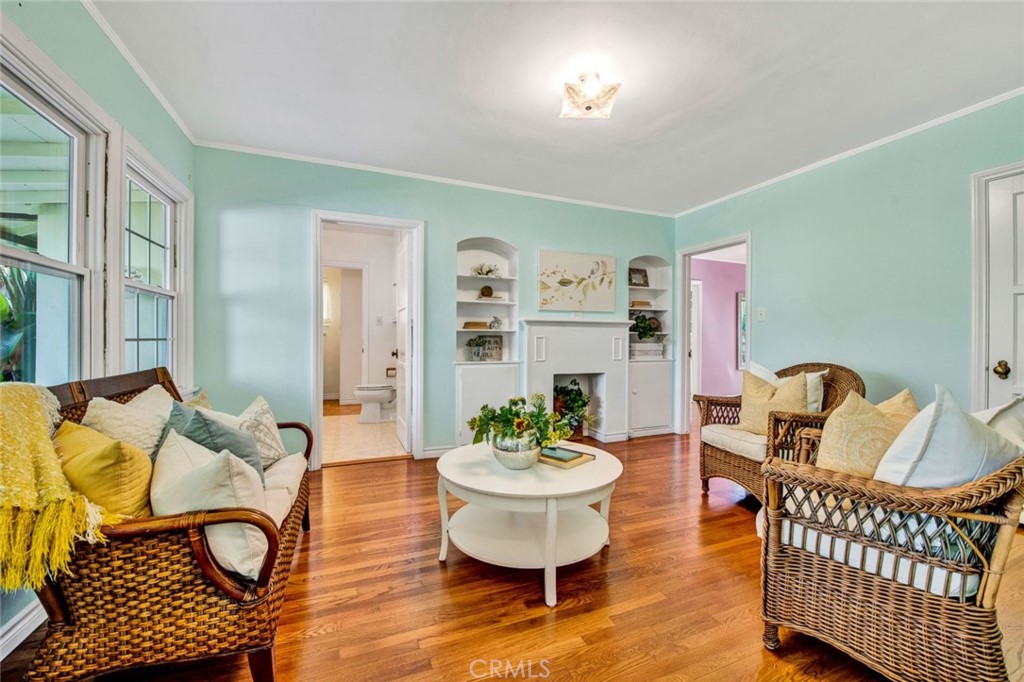 1722 North Flower Street Santa Ana, CA 92706 - Photo 13 of 25 a living room with furniture a table and a potted plant