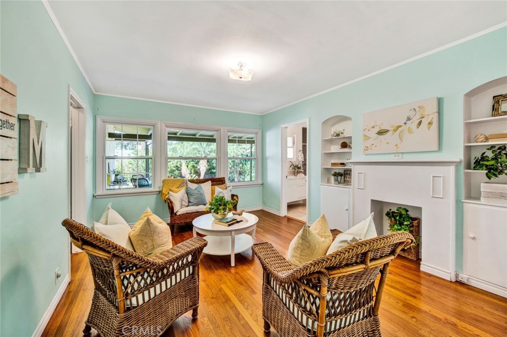 1722 North Flower Street Santa Ana, CA 92706 - Photo 14 of 25 a living room with furniture and a fireplace
