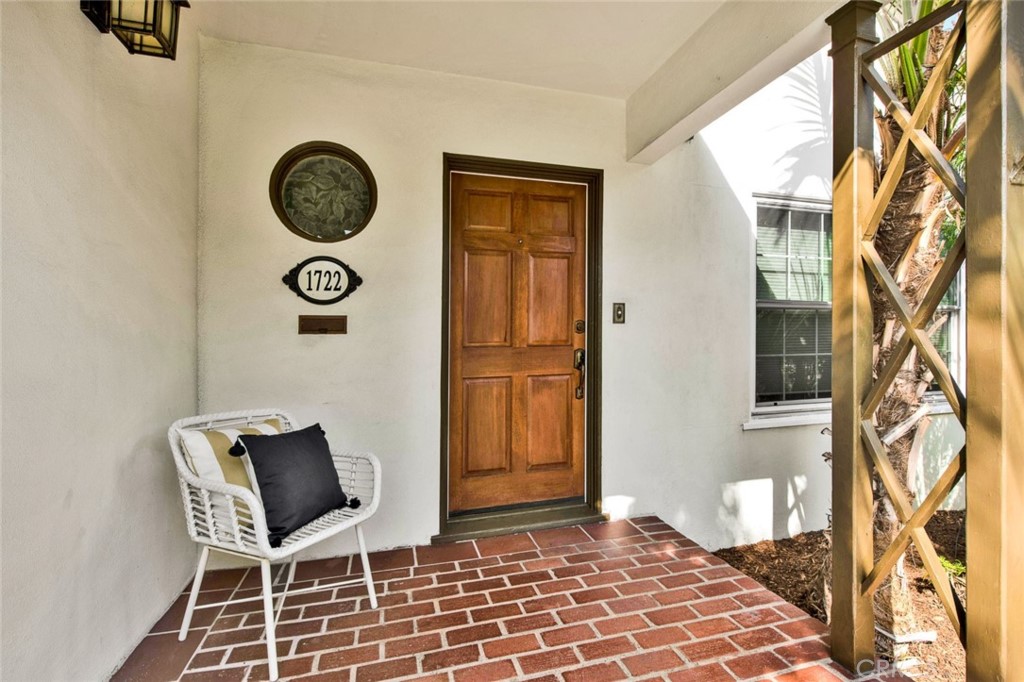 1722 North Flower Street Santa Ana, CA 92706 - Photo 2 of 25 a view of a door and chair in the house