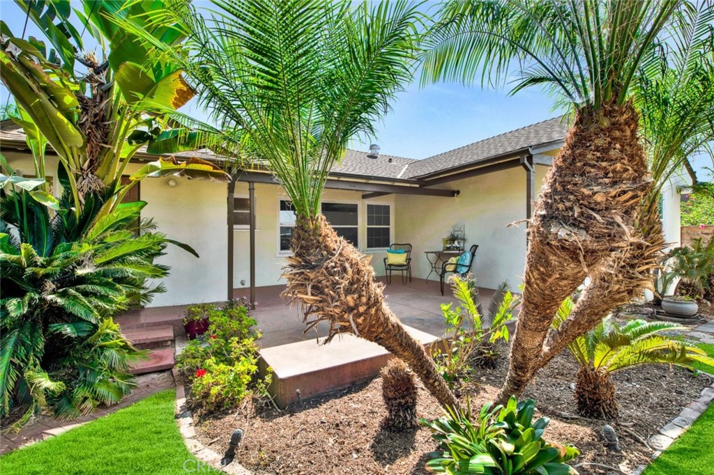 1722 North Flower Street Santa Ana, CA 92706 - Photo 23 of 25 a front view of a house with garden