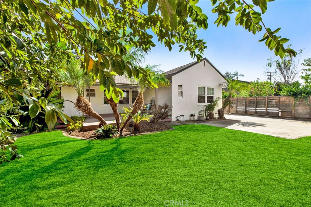 1722 North Flower Street Santa Ana, CA 92706 - Photo 24 of 25 a view of a house with backyard and a tree